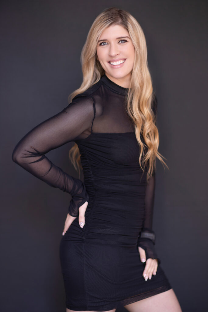 Jessica posing confidently for her professional women's portrait session